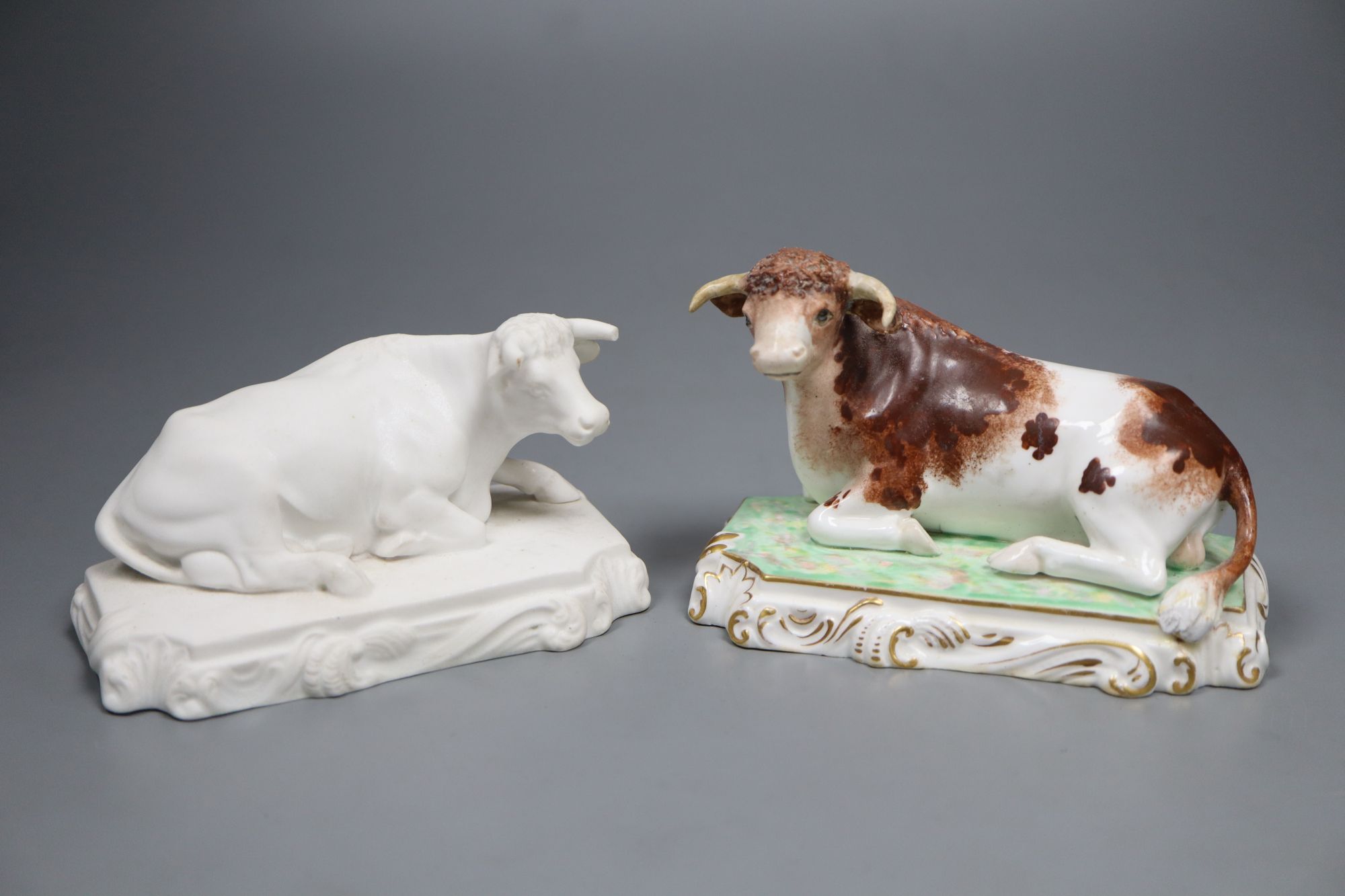 Two rare Copeland & Garrett porcelain recumbent figures of bulls, c.1833-47, 12.5cm long,